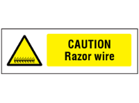 Caution Razor wire safety sign.