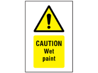 Caution Wet paint symbol and text safety sign.