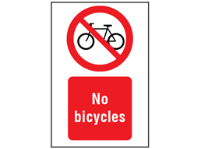 No bicycles symbol and text safety sign.