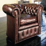 Distressed leather armchair&nbsp;