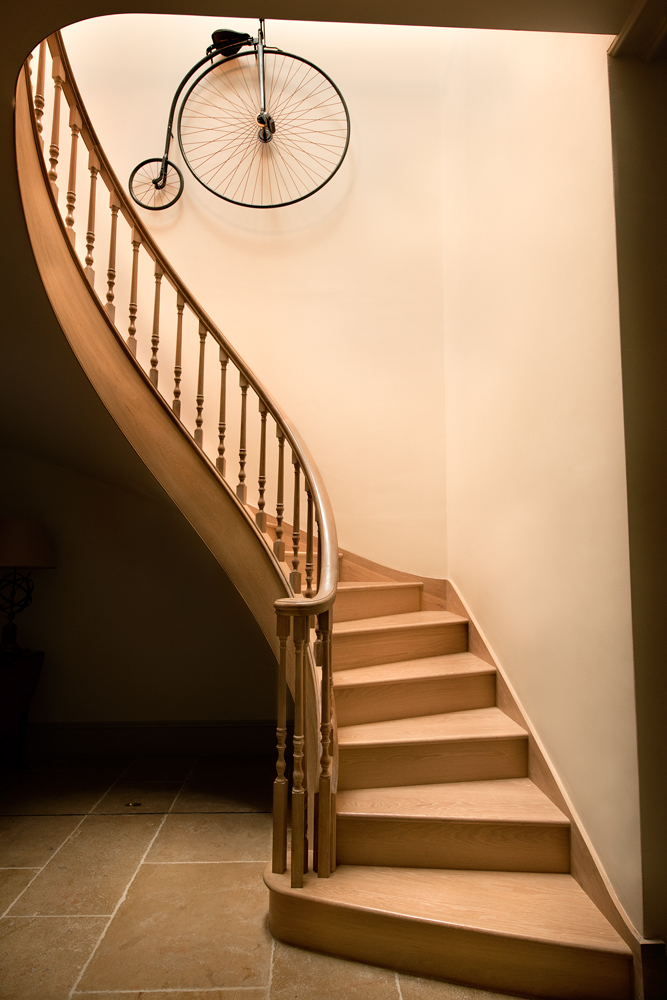 Curved staircase in limed oak