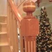 Staircase with Fluted Maple Inlays and Decorative Maple Bands and Knobs In Wickford