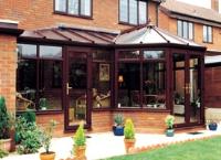 Mahogany Effect Edwardian L Shape Conservatory In Eastbourne