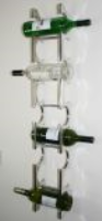 9 Bottle cast and polished solid aluminium wall wine rack