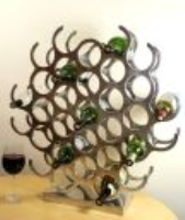 31 Bottle cast and polished solid aluminium wine rack