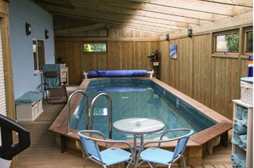 Wooden Cabin Swimming Pool Cover Builders