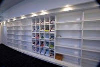 Built in office book storage shelving 