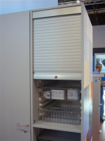 Productive ward storage cupboard with roller shutter door