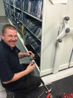 Servicing of office roller shelving